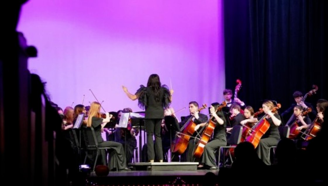 Ms. Bradby conducting at the Fall Concert