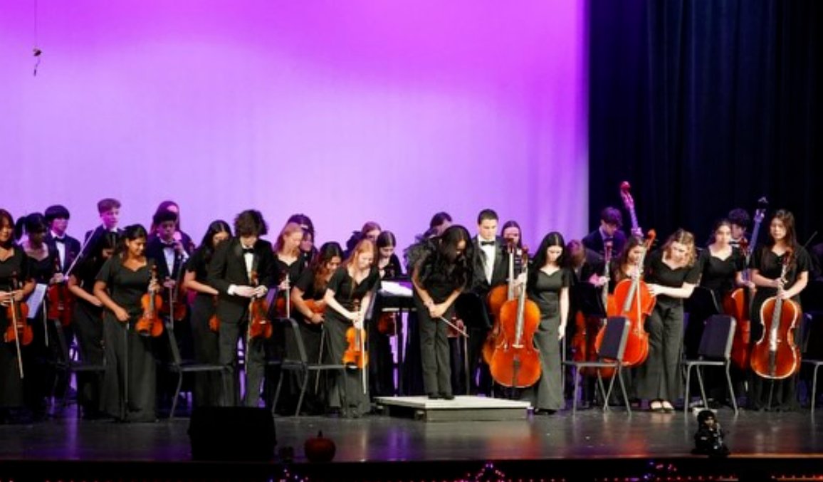 Full orchestra bow at Fall Concert